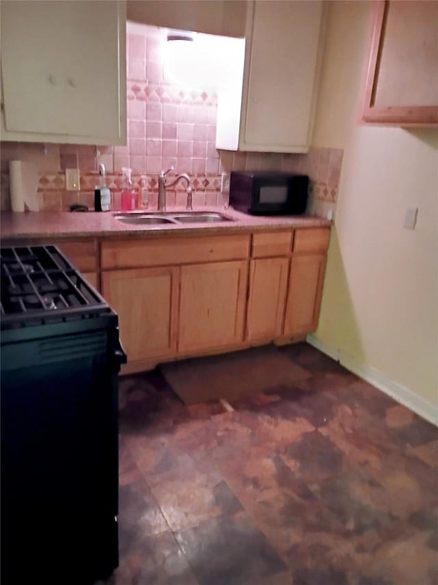 4330 Wabash Ave, Fort Worth, TX 76133 - kitchen featuring a sink, black appliances, decorative backsplash, light brown cabinets, and light countertops