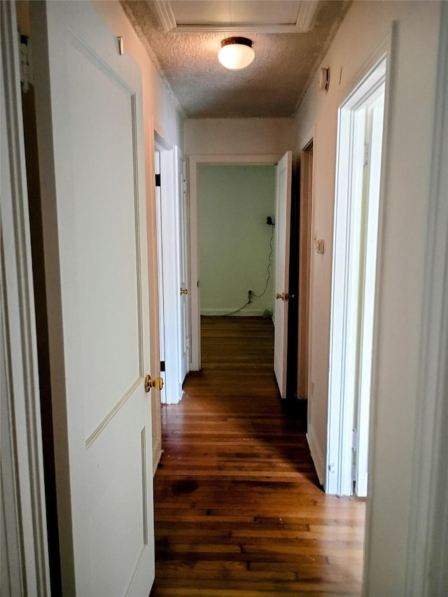 4330 Wabash Ave, Fort Worth, TX 76133 - hall featuring dark wood-style flooring, a textured ceiling, and attic access
