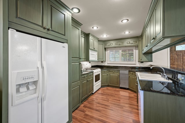 400 Titus St, Mckinney, TX 75069 - kitchen with white appliances, green cabinetry, a sink, plenty of natural light, and recessed lighting