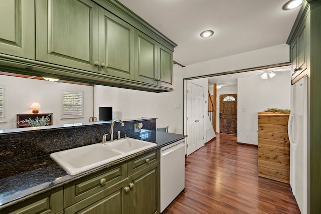 400 Titus St, Mckinney, TX 75069 - kitchen with green cabinets, white appliances, a sink, dark wood-style floors, and recessed lighting