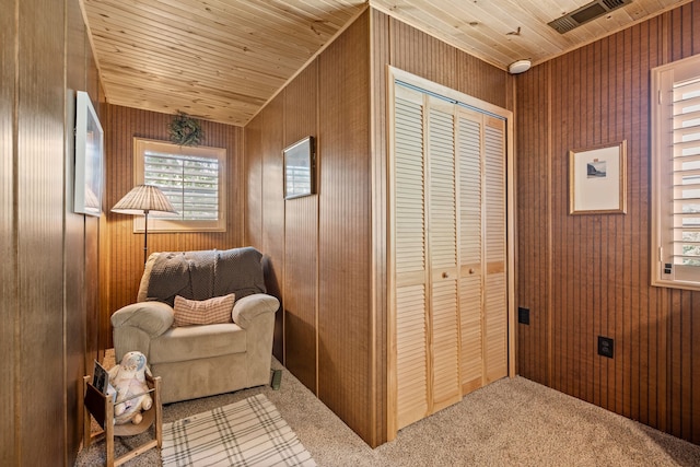 400 Titus St, Mckinney, TX 75069 - living area featuring carpet, healthy amount of natural light, and wooden walls