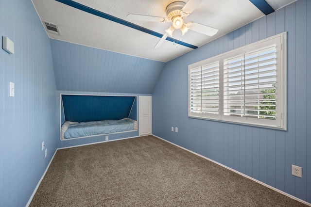 400 Titus St, Mckinney, TX 75069 - unfurnished bedroom with vaulted ceiling, carpet floors, ceiling fan, and baseboards