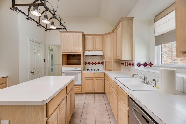 1213 Sonoma Dr, Allen, TX 75013 - kitchen featuring white appliances, light brown cabinetry, under cabinet range hood, a sink, and backsplash