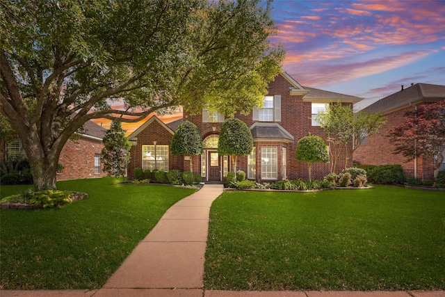 1213 Sonoma Dr, Allen, TX 75013 - view of front facade with brick siding and a lawn