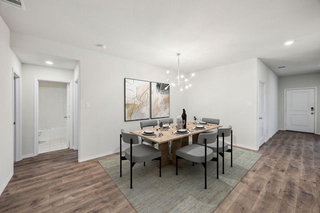 913 Alton Dr, Aubrey, TX 76227 - dining room featuring wood finished floors, a chandelier, and recessed lighting