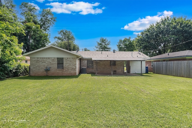 5710 Grover Pl, Shreveport, LA 71105 - back of property featuring brick siding and central AC unit