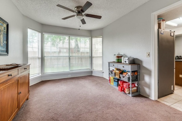 238 Browning Ln, Grand Prairie, TX 75052 - rec room featuring plenty of natural light, ceiling fan, light carpet, and a textured ceiling