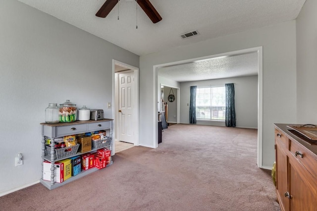 238 Browning Ln, Grand Prairie, TX 75052 - rec room with light colored carpet, ceiling fan, baseboards, and a textured ceiling
