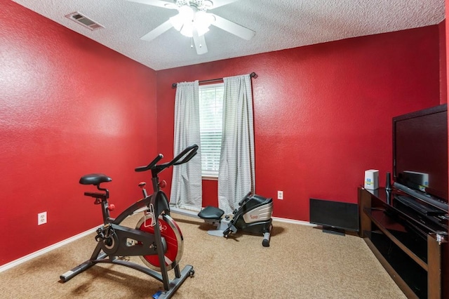 238 Browning Ln, Grand Prairie, TX 75052 - workout area featuring carpet flooring, a textured ceiling, a ceiling fan, a textured wall, and baseboards