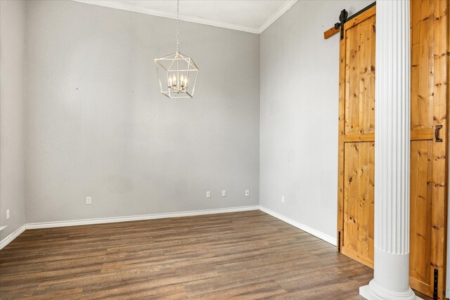 2809 Rock Church Hwy, Tolar, TX 76476 - unfurnished dining area featuring crown molding, baseboards, a barn door, dark wood-style floors, and a chandelier