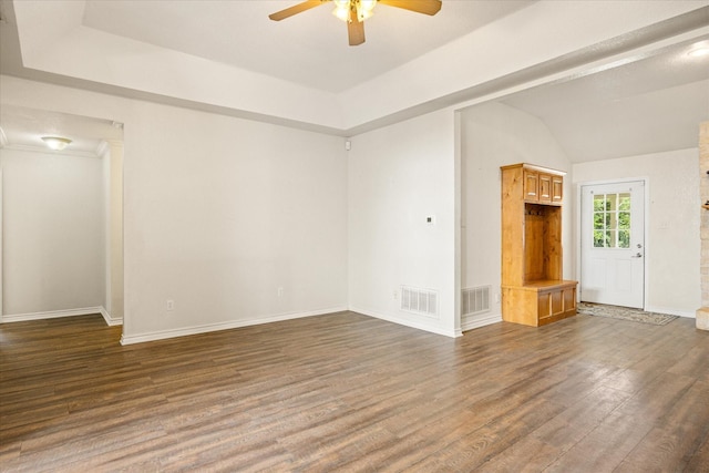 2809 Rock Church Hwy, Tolar, TX 76476 - unfurnished living room with ceiling fan, a tray ceiling, dark wood-style floors, and baseboards