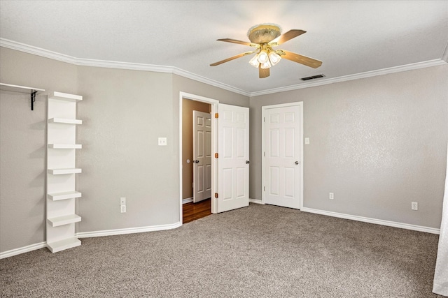 2809 Rock Church Hwy, Tolar, TX 76476 - unfurnished bedroom with crown molding, carpet flooring, baseboards, and ceiling fan