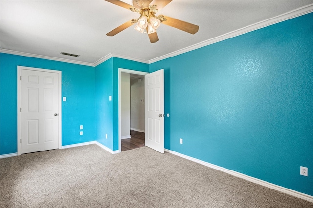 2809 Rock Church Hwy, Tolar, TX 76476 - unfurnished bedroom with crown molding, baseboards, carpet, and ceiling fan