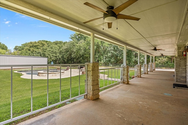 2809 Rock Church Hwy, Tolar, TX 76476 - view of patio featuring ceiling fan and a fire pit
