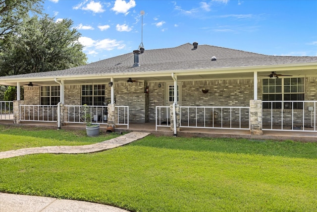 2809 Rock Church Hwy, Tolar, TX 76476 - back of house featuring ceiling fan, a yard, brick siding, and a patio area