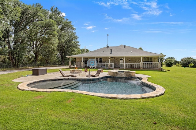 2809 Rock Church Hwy, Tolar, TX 76476 - view of swimming pool with a patio, a yard, a fire pit, and a pool with connected hot tub