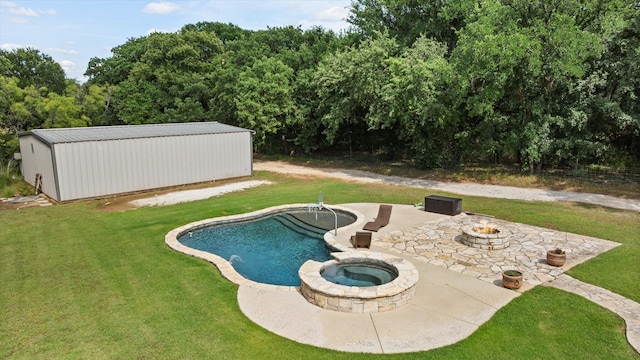 2809 Rock Church Hwy, Tolar, TX 76476 - view of swimming pool with a fire pit, a lawn, a patio area, a pool with connected hot tub, and an outdoor structure