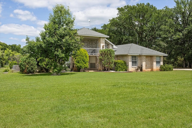 2809 Rock Church Hwy, Tolar, TX 76476 - view of property hidden behind natural elements featuring stone siding, a front lawn, and a shingled roof