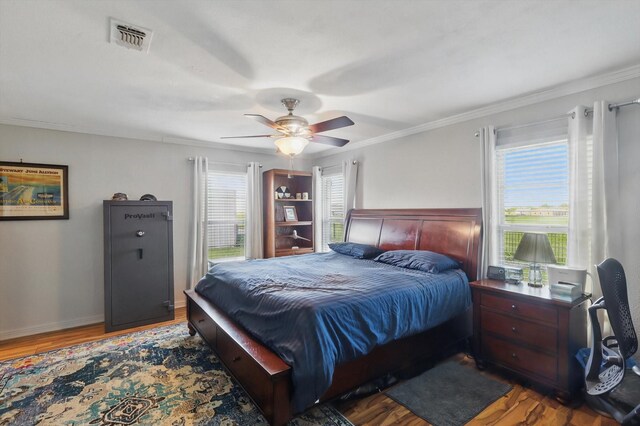177 Graben Ln, Rhome, TX 76078 - bedroom with crown molding, wood finished floors, and ceiling fan