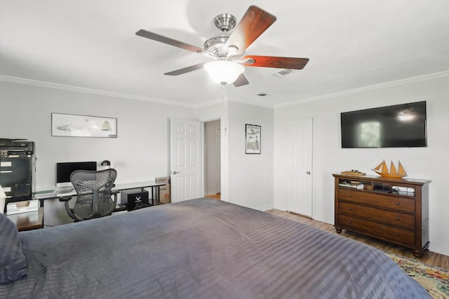 177 Graben Ln, Rhome, TX 76078 - bedroom with wood finished floors, crown molding, ceiling fan, baseboards, and an office area