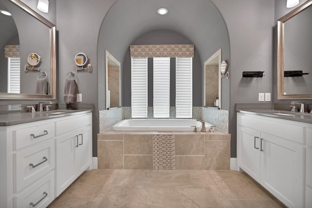 4350 Bristleleaf Ln, Prosper, TX 75078 - full bath featuring a garden tub and two vanities