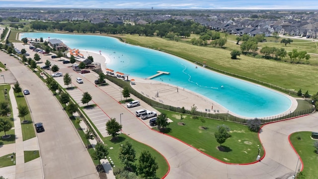 4350 Bristleleaf Ln, Prosper, TX 75078 - bird's eye view of a pool area and a nearby body of water