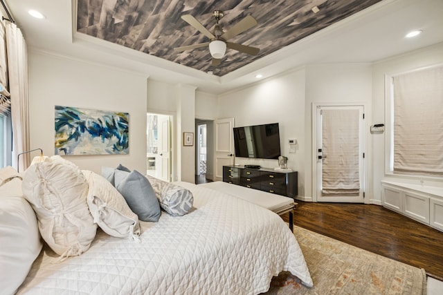 1260 Stanhope Ct, Southlake, TX 76092 - bedroom featuring a tray ceiling, dark wood-type flooring, crown molding, recessed lighting, and a ceiling fan