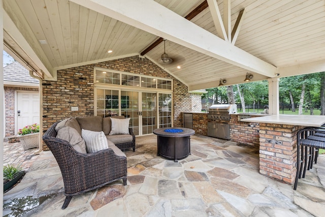 1260 Stanhope Ct, Southlake, TX 76092 - view of patio / terrace with an outdoor kitchen and an outdoor living space with a fire pit