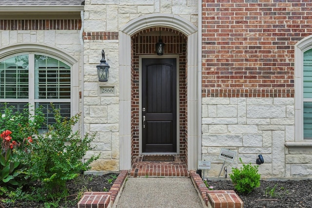 2866 Milsons Point Dr, Trophy Club, TX 76262 - property entrance with stone siding and brick siding