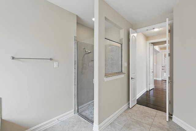 2866 Milsons Point Dr, Trophy Club, TX 76262 - bathroom featuring a tile shower and tile patterned flooring