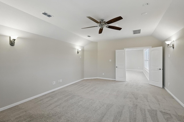 2866 Milsons Point Dr, Trophy Club, TX 76262 - spare room featuring vaulted ceiling, a ceiling fan, and light colored carpet