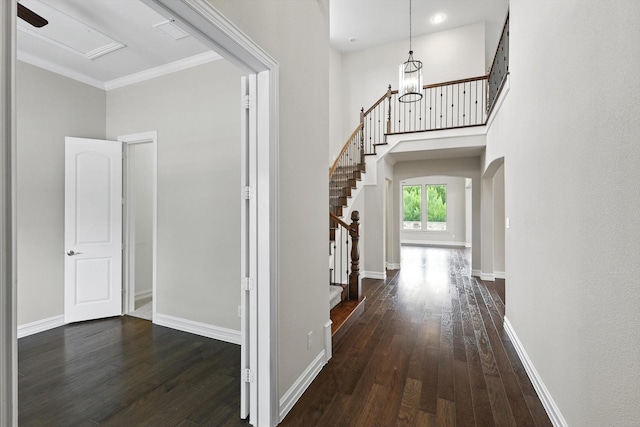 2866 Milsons Point Dr, Trophy Club, TX 76262 - foyer with hardwood / wood-style flooring, stairs, a high ceiling, and crown molding