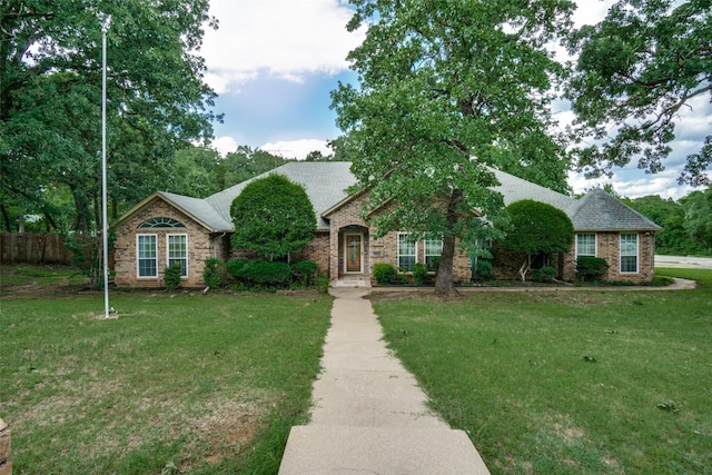 4465 Northern Dancer Dr, Burleson, TX 76028 - view of front of home featuring a shingled roof and brick siding