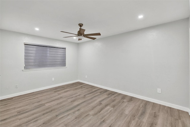 2308 Foxcroft Ln, Arlington, TX 76014 - spare room with ceiling fan, recessed lighting, wood finished floors, and baseboards