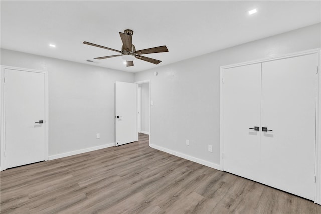 2308 Foxcroft Ln, Arlington, TX 76014 - unfurnished bedroom featuring wood finished floors, recessed lighting, a ceiling fan, and baseboards