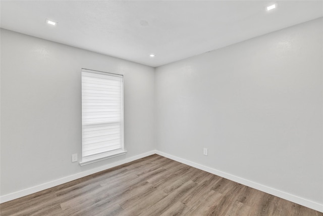 2308 Foxcroft Ln, Arlington, TX 76014 - unfurnished room featuring wood finished floors, baseboards, and recessed lighting