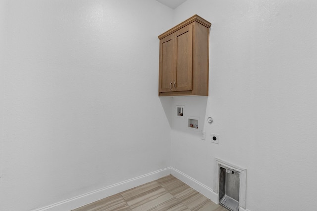 2213 Windy Hill Ln, Waxahachie, TX 75167 - washroom featuring hookup for an electric dryer, washer hookup, baseboards, hookup for a gas dryer, and cabinet space