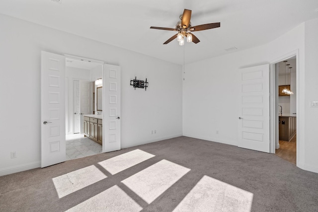 2213 Windy Hill Ln, Waxahachie, TX 75167 - unfurnished bedroom with carpet flooring, ensuite bathroom, and baseboards