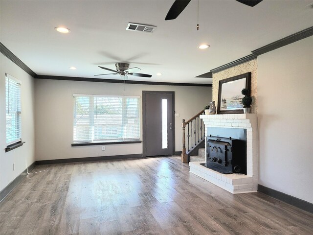 9306 High Noon Dr, Wylie, TX 75098 - unfurnished living room featuring ornamental molding, a ceiling fan, baseboards, recessed lighting, and wood finished floors
