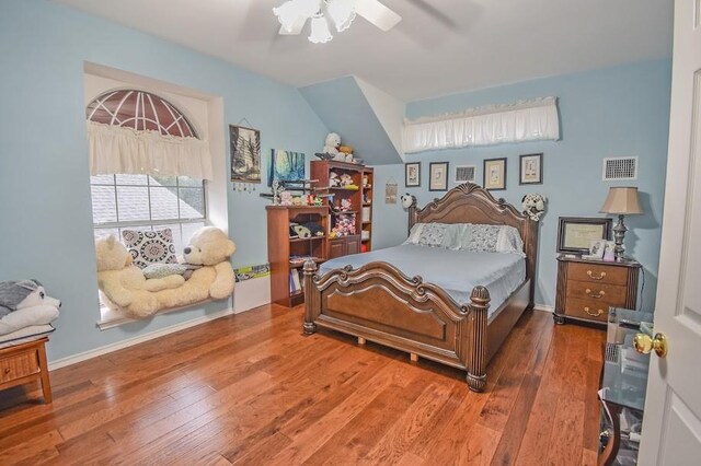 8887 Random Rd, Fort Worth, TX 76179 - bedroom featuring wood finished floors, a ceiling fan, and baseboards
