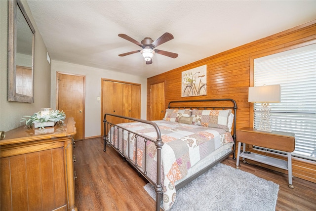 203 King Laurence, Scroggins, TX 75480 - bedroom with wood finished floors, ceiling fan, and a textured ceiling