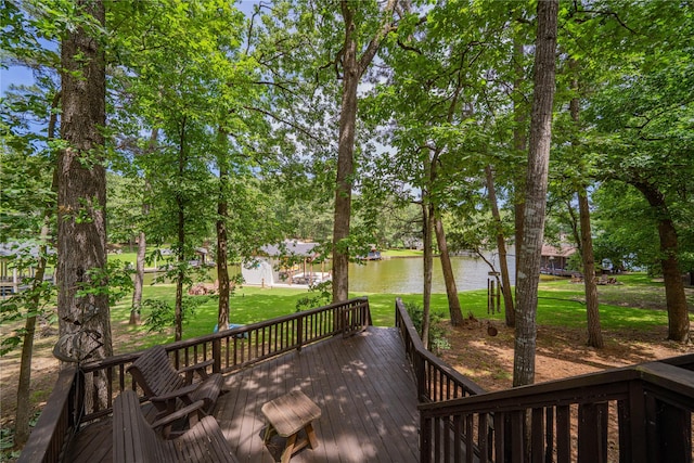 203 King Laurence, Scroggins, TX 75480 - wooden deck featuring a water view, a lawn, and view of wooded area