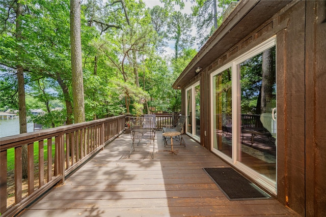 203 King Laurence, Scroggins, TX 75480 - wooden deck with view of wooded area