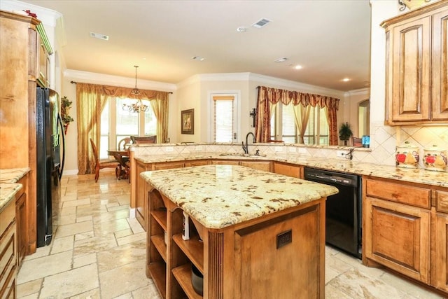 2221 Southern Oaks Dr, Cedar Hill, TX 75104 - kitchen featuring black appliances, a sink, a peninsula, a chandelier, and ornamental molding