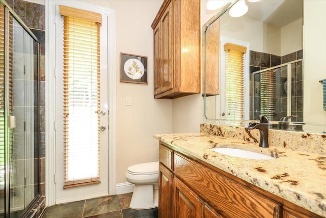 2221 Southern Oaks Dr, Cedar Hill, TX 75104 - full bathroom with toilet, vanity, and a shower stall