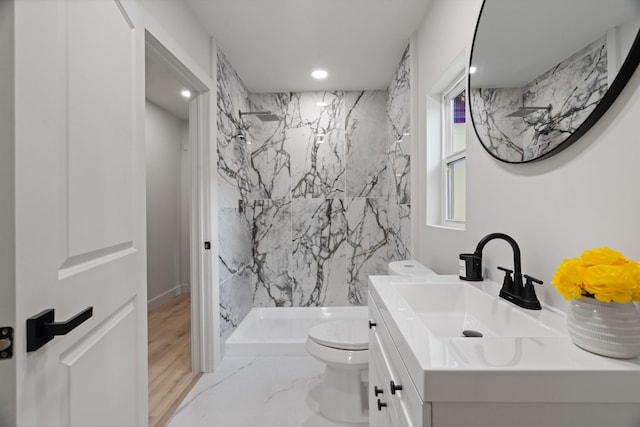 3009 Ave H, Fort Worth, TX 76105 - bathroom with toilet, a marble finish shower, vanity, and recessed lighting