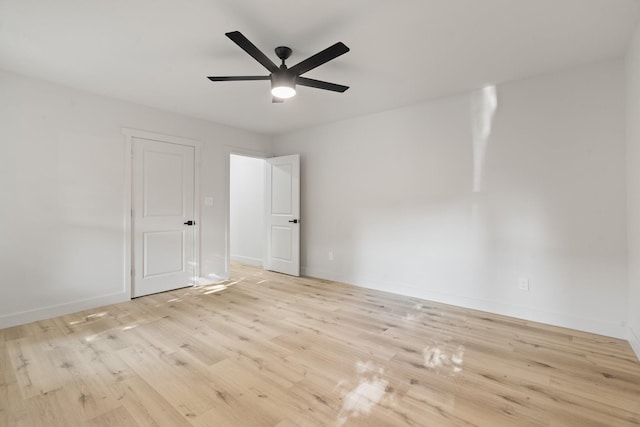 3009 Ave H, Fort Worth, TX 76105 - unfurnished room featuring light wood-type flooring, ceiling fan, and baseboards