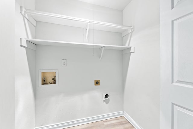 600 Via Del Sur Spur, Mesquite, TX 75150 - laundry room featuring electric dryer hookup, attic access, hookup for a washing machine, wood finished floors, and baseboards