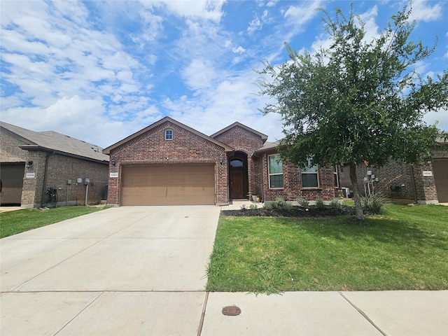 11520 Starlight Ranch Trl, Fort Worth, TX 76052 - view of front of home featuring brick siding, a garage, concrete driveway, and a front lawn