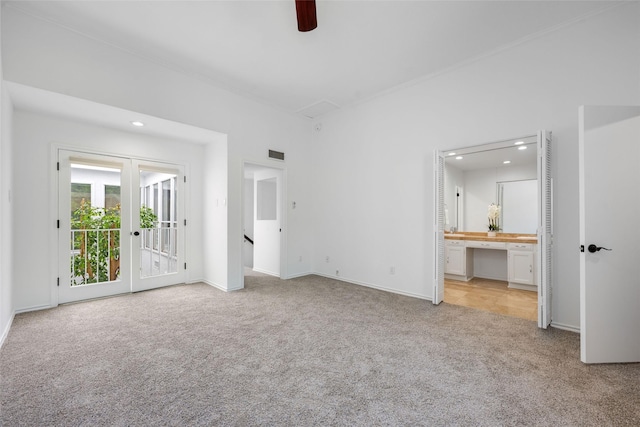 3227 Elizabeth St, Dallas, TX 75204 - unfurnished bedroom with light colored carpet, access to exterior, recessed lighting, connected bathroom, and a ceiling fan